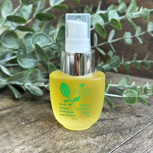 Huile d'argan pour la peau et les cheveux dans une bouteille vaporisatrice