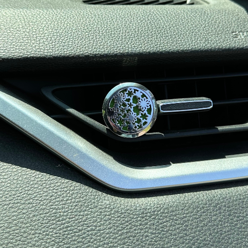 diffuseur de parfum pour voiture avec des fleurs et des étoiles