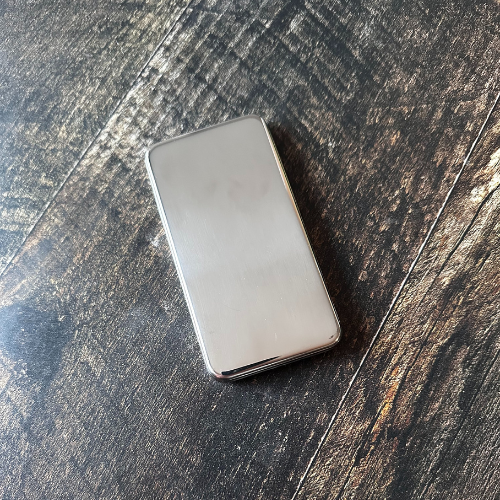 Inox ice pack on a wood board