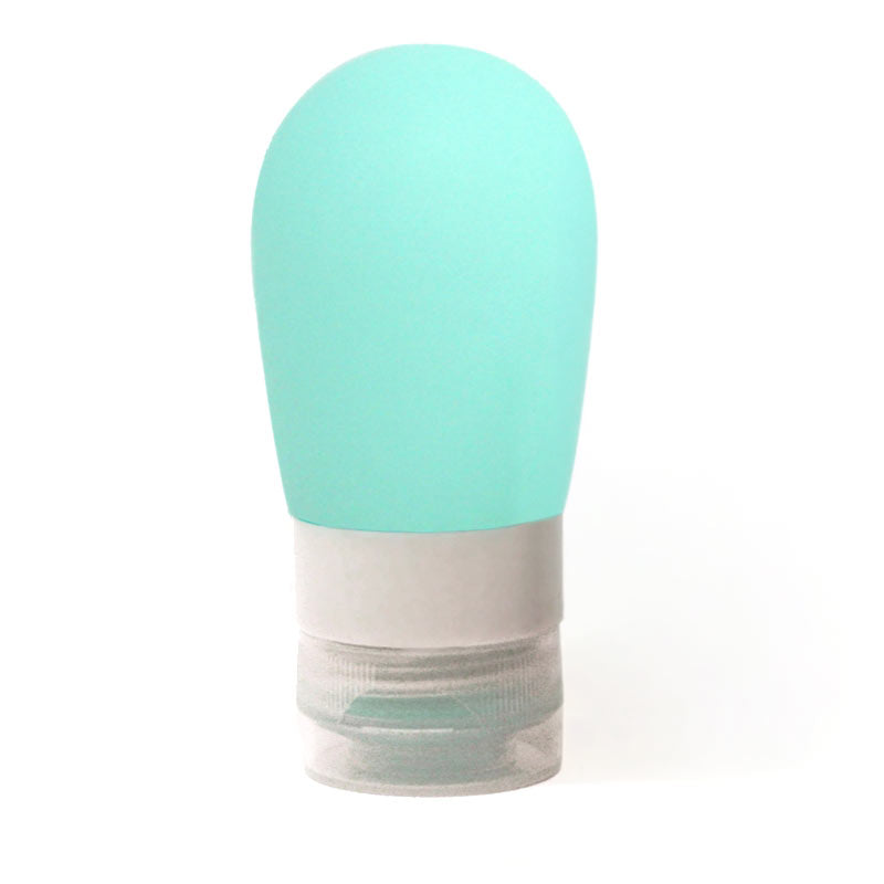 Petit contenant de silicone bleu aqua sur fond blanc