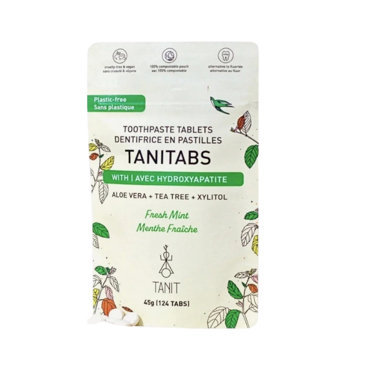 Un sachet de dentifrice en pastilles sur lequel il est écrit Tanitab menthe fraiche Tanit aide à renforcer la dent sur un fond blanc