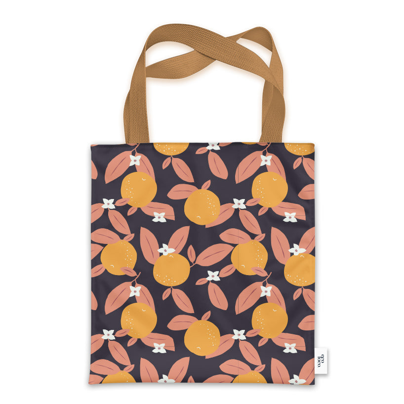 Sac fourre-tout avec motif d'oranges et les ganses beiges sur fond blanc