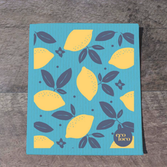 Chiffon suédois avec des citrons jaune sur un fond bleu déposés sur une planche de bois et avec le logo de Eco Loco 