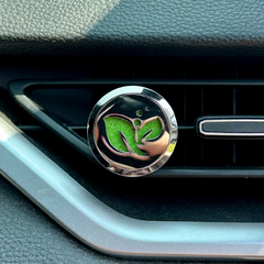 Diffuseur d'huile essentielle pour auto dans la ventilation, motif de feuilles en acier inoxydable