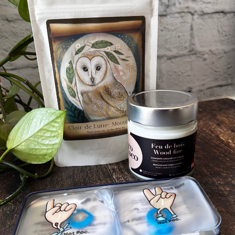 Ensemble d'une tisane locale de la forêt boréale, une chandelle en cire de soya odeur feu de foret et des chauffes mains réutilisables. 