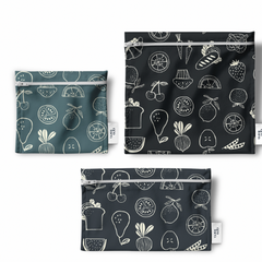 3 sacs réutilisables à lunch ou multiusage en tissu avec des motifs de fruits et légume, noir et gris sur un fond blanc et une étiquette Eco Loco