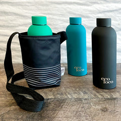 sac réutilisable lavable pour mettre une bouteille d'eau à transporter de couleur noire et blanche avec trois bouteilles d'eau
